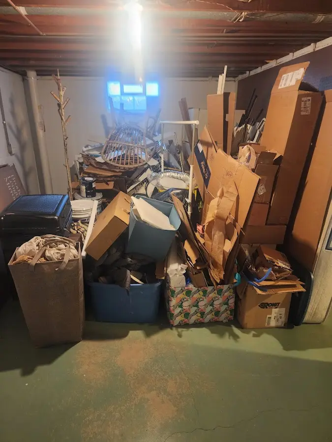 Roll-off dumpster container at job site for 20 Yard Dumpster Rental in Tucker